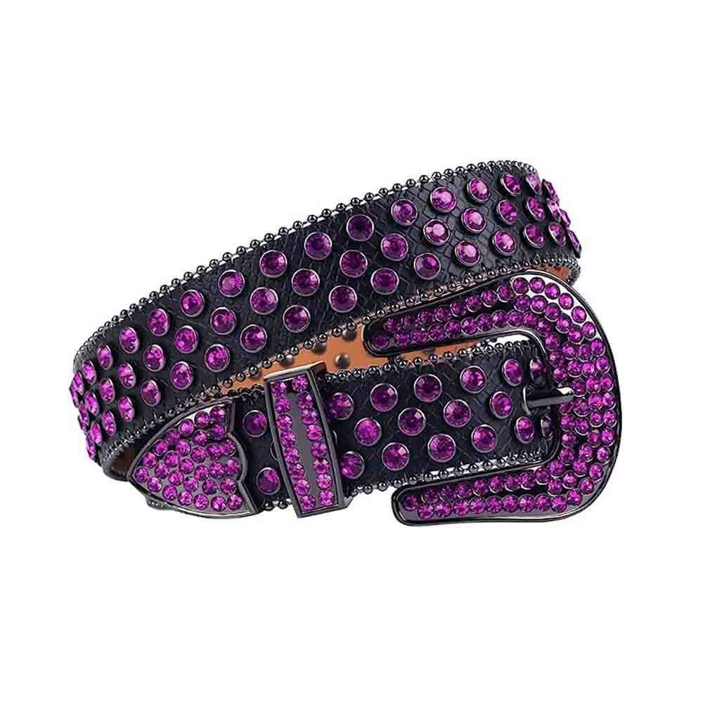 Unisex Black Leather Belt with Purple Real Rhinestones & Classic Black Buckle Add a touch of luxury and sparkle to your outfit with the Unisex Black Leather Belt from Real Rhinestone. Featuring a sleek black leather strap, this stylish belt is adorned with Purple diamond rhinestones, creating a bold and glamorous look. The Black buckle, decorated with Purple crystal rhinestones, enhances the design with extra shine and sophistication. Designed for versatility and comfort, this belt is perfect for both casual and dressy occasions. Whether you're looking to complete a hip-hop-inspired outfit, make a statement at an event, or simply add some extra bling to your wardrobe, this belt is the perfect accessory. Its adjustable fit ensures all-day comfort, while the high-quality materials guarantee durability and long-lasting wear. Elevate your style effortlessly with the Unisex Black Leather Belt. Whether you're hitting the stage, going out with friends, or just upgrading your everyday look, this belt is a must-have. Order now from Real Rhinestone and bring some diamond-studded brilliance to your collection. Material: Premium Leather Rhinestone: Luxury Hand-Set High-Gloss Crystal Diamond Embellishments Buckle Type: Classic Horseshoe Zinc Buckle Set Featuring Engraved Design & Sparkling Rhinestones Width: 4cm (1.5 Inch) Style: Streetwear, Cowboy, Western, Partywear, Festivals & Performances, Fashion, Hip Hop, Bling, Diamond Belt Measurement: Please note that measurements may vary by 1-2 cm. Our belts are measured from the fold where the buckle is attached to the middle hole. For the best fit, we recommend measuring a belt you already own from the fold to the hole you use most frequently. Ideally, the belt should be worn on the third hole for optimal fit and comfort.