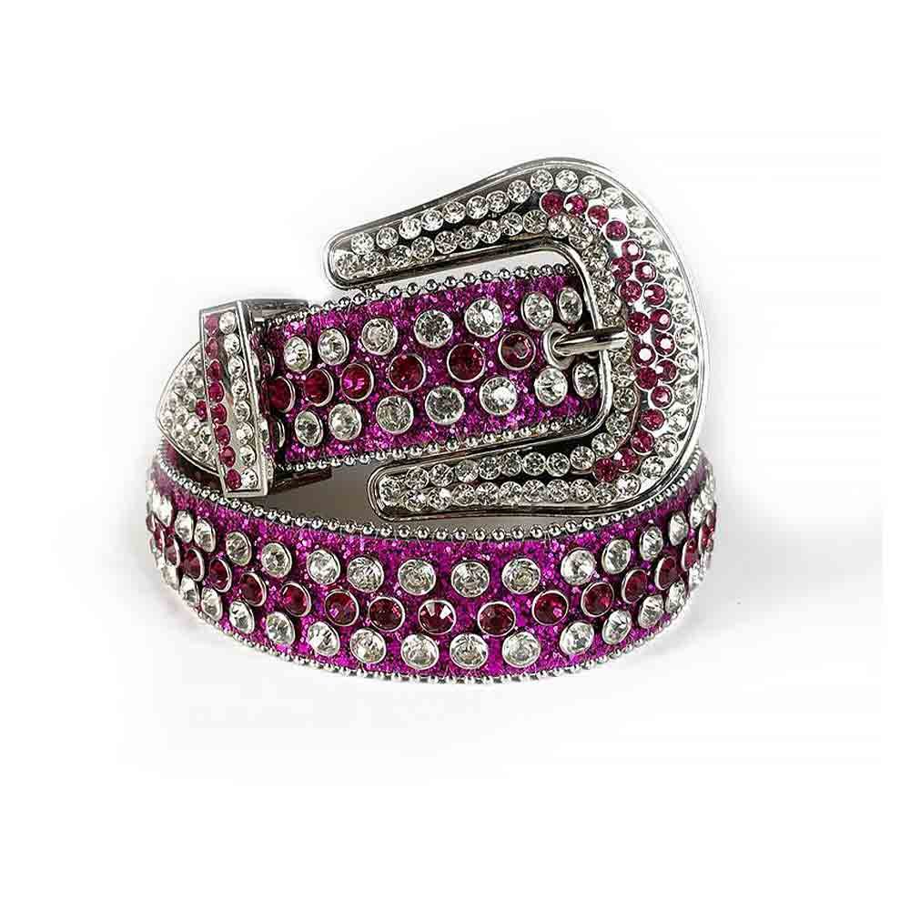 Unisex Fuchsia Leather Belt with White and Purple Color Real Rhinestones & Classic Silver Buckle Add a touch of luxury and sparkle to your outfit with the Unisex Fuchsia Shimmer Leather Belt from Real Rhinestone. Featuring a sleek Fuchsia leather strap, this stylish belt is adorned with White and Purple Color diamond rhinestones, creating a bold and glamorous look. The Silver buckle, decorated with White and Purple crystal rhinestones, enhances the design with extra shine and sophistication. Designed for versatility and comfort, this belt is perfect for both casual and dressy occasions. Whether you're looking to complete a hip-hop-inspired outfit, make a statement at an event, or simply add some extra bling to your wardrobe, this belt is the perfect accessory. Its adjustable fit ensures all-day comfort, while the high-quality materials guarantee durability and long-lasting wear. Elevate your style effortlessly with the Unisex Fuchsia Shimmer Leather Belt. Whether you're hitting the stage, going out with friends, or just upgrading your everyday look, this belt is a must-have. Order now from Real Rhinestone and bring some diamond-studded brilliance to your collection. Material: Premium Leather Rhinestone: Luxury Hand-Set High-Gloss Crystal Diamond Embellishments Buckle Type: Classic Horseshoe Zinc Buckle Set Featuring Engraved Design & Sparkling Rhinestones Width: 4cm (1.5 Inch) Style: Streetwear, Cowboy, Western, Partywear, Festivals & Performances, Fashion, Hip Hop, Bling, Diamond Belt Measurement: Please note that measurements may vary by 1-2 cm. Our belts are measured from the fold where the buckle is attached to the middle hole. For the best fit, we recommend measuring a belt you already own from the fold to the hole you use most frequently. Ideally, the belt should be worn on the third hole for optimal fit and comfort.