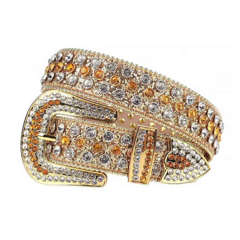Unisex Gold Shimmer Leather Belt with Silver and Gold Real Rhinestones & Classic Gold Buckle Add a touch of luxury and sparkle to your outfit with the Unisex Gold Leather Belt from Real Rhinestone. Featuring a sleek Gold leather strap, this stylish belt is adorned with Silver and Gold diamond rhinestones, creating a bold and glamorous look. The Gold buckle, decorated with White and Gold crystal rhinestones, enhances the design with extra shine and sophistication. Designed for versatility and comfort, this belt is perfect for both casual and dressy occasions. Whether you're looking to complete a hip-hop-inspired outfit, make a statement at an event, or simply add some extra bling to your wardrobe, this belt is the perfect accessory. Its adjustable fit ensures all-day comfort, while the high-quality materials guarantee durability and long-lasting wear. Elevate your style effortlessly with the Unisex Gold Leather Belt. Whether you're hitting the stage, going out with friends, or just upgrading your everyday look, this belt is a must-have. Order now from Real Rhinestone and bring some diamond-studded brilliance to your collection. Material: Premium Leather Rhinestone: Luxury Hand-Set High-Gloss Crystal Diamond Embellishments Buckle Type: Classic Horseshoe Zinc Buckle Set Featuring Engraved Design & Sparkling Rhinestones Width: 4cm (1.5 Inch) Style: Streetwear, Cowboy, Western, Partywear, Festivals & Performances, Fashion, Hip Hop, Bling, Diamond Belt Measurement: Please note that measurements may vary by 1-2 cm. Our belts are measured from the fold where the buckle is attached to the middle hole. For the best fit, we recommend measuring a belt you already own from the fold to the hole you use most frequently. Ideally, the belt should be worn on the third hole for optimal fit and comfort.