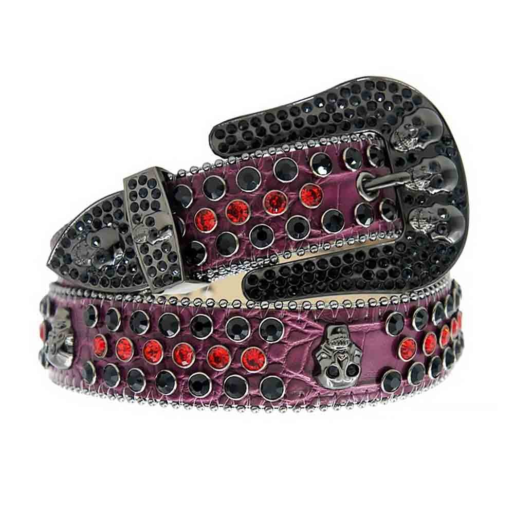 Unisex Purple Leather Belt with Skulls Studded Black and Red Real Rhinestones & Classic Black Skull Buckle Add a touch of luxury and sparkle to your outfit with the Unisex Purple Leather Belt from Real Rhinestone. Featuring a sleek Purple leather strap, this stylish belt is adorned with Black and Red Color diamond rhinestones, creating a bold and glamorous look. The Black buckle, decorated with black and red crystal rhinestones, enhances the design with extra shine and sophistication. Designed for versatility and comfort, this belt is perfect for both casual and dressy occasions. Whether you're looking to complete a hip-hop-inspired outfit, make a statement at an event, or simply add some extra bling to your wardrobe, this belt is the perfect accessory. Its adjustable fit ensures all-day comfort, while the high-quality materials guarantee durability and long-lasting wear. Elevate your style effortlessly with the Unisex Purple Leather Belt. Whether you're hitting the stage, going out with friends, or just upgrading your everyday look, this belt is a must-have. Order now from Real Rhinestone and bring some diamond-studded brilliance to your collection. Material: Premium Leather Rhinestone: Luxury Hand-Set High-Gloss Crystal Diamond Embellishments Buckle Type: Classic Horseshoe Zinc Buckle Set Featuring Engraved Design & Sparkling Rhinestones Width: 4cm (1.5 Inch) Style: Streetwear, Cowboy, Western, Partywear, Festivals & Performances, Fashion, Hip Hop, Bling, Diamond Belt Measurement: Please note that measurements may vary by 1-2 cm. Our belts are measured from the fold where the buckle is attached to the middle hole. For the best fit, we recommend measuring a belt you already own from the fold to the hole you use most frequently. Ideally, the belt should be worn on the third hole for optimal fit and comfort.