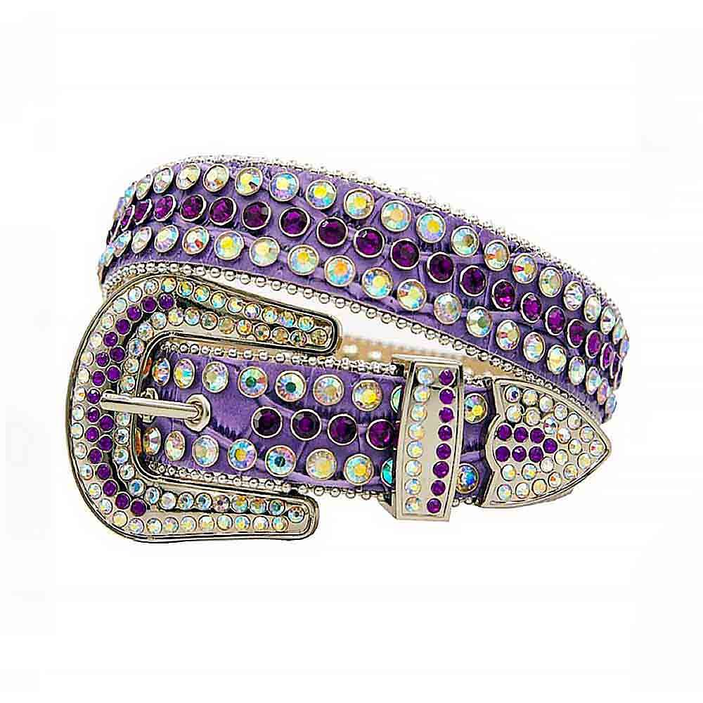 Unisex Purple Leather Belt with Iridescent and Purple Color Real Rhinestones & Classic Silver Buckle Add a touch of luxury and sparkle to your outfit with the Unisex Purple Leather Belt from Real Rhinestone. Featuring a sleek Purple leather strap, this stylish belt is adorned with Iridescent and Purple diamond rhinestones, creating a bold and glamorous look. The Silver buckle, decorated with Iridescent and Purple crystal rhinestones, enhances the design with extra shine and sophistication. Designed for versatility and comfort, this belt is perfect for both casual and dressy occasions. Whether you're looking to complete a hip-hop-inspired outfit, make a statement at an event, or simply add some extra bling to your wardrobe, this belt is the perfect accessory. Its adjustable fit ensures all-day comfort, while the high-quality materials guarantee durability and long-lasting wear. Elevate your style effortlessly with the Unisex Purple Leather Belt. Whether you're hitting the stage, going out with friends, or just upgrading your everyday look, this belt is a must-have. Order now from Real Rhinestone and bring some diamond-studded brilliance to your collection. Material: Premium Leather Rhinestone: Luxury Hand-Set High-Gloss Crystal Diamond Embellishments Buckle Type: Classic Horseshoe Zinc Buckle Set Featuring Engraved Design & Sparkling Rhinestones Width: 4cm (1.5 Inch) Style: Streetwear, Cowboy, Western, Partywear, Festivals & Performances, Fashion, Hip Hop, Bling, Diamond Belt Measurement: Please note that measurements may vary by 1-2 cm. Our belts are measured from the fold where the buckle is attached to the middle hole. For the best fit, we recommend measuring a belt you already own from the fold to the hole you use most frequently. Ideally, the belt should be worn on the third hole for optimal fit and comfort.