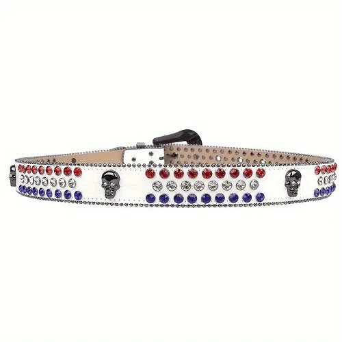 Unisex White Leather Belt with Skulls Studded All Red, Blue and White Real Rhinestones & Classic Gray Skull Buckle Add a touch of luxury and sparkle to your outfit with the Unisex White Leather Belt from Real Rhinestone. Featuring a sleek White leather strap, this stylish belt is adorned with Red, Blue and White Color diamond rhinestones, creating a bold and glamorous look. The Gray buckle, silver crystal rhinestones, enhances the design with extra shine and sophistication. Designed for versatility and comfort, this belt is perfect for both casual and dressy occasions. Whether you are looking to complete a hip-hop-inspired outfit, make a statement at an event, or simply add some extra bling to your wardrobe, this belt is the perfect accessory. Its adjustable fit ensures all-day comfort, while the high-quality materials guarantee durability and long-lasting wear. Elevate your style effortlessly with the Unisex White Leather Belt. Whether you are hitting the stage, going out with friends, or just upgrading your everyday look, this belt is a must-have. Order now from Real Rhinestone and bring some diamond-studded brilliance to your collection. Material: Premium Leather Rhinestone: Luxury Hand-Set High-Gloss Crystal Diamond Embellishments Buckle Type: Classic Horseshoe And Skull Zinc Buckle Set Featuring Engraved Design & Sparkling Rhinestones Width: 4cm (1.5 Inch) Style: Streetwear, Cowboy, Western, Partywear, Festivals & Performances, Fashion, Hip Hop, Bling, Diamond Belt Measurement: Please note that measurements may vary by 1-2 cm. Our belts are measured from the fold where the buckle is attached to the middle hole. For the best fit, we recommend measuring a belt you already own from the fold to the hole you use most frequently. Ideally, the belt should be worn on the third hole for optimal fit and comfort.