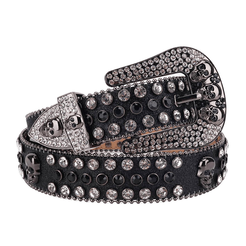 Unisex Black Leather Belt with Skulls Studded Black and Silver Real Rhinestones & Classic Gray Skull Buckle Add a touch of luxury and sparkle to your outfit with the Unisex Black Leather Belt from Real Rhinestone. Featuring a sleek Black leather strap, this stylish belt is adorned with Black and silver Color diamond rhinestones, creating a bold and glamorous look. The Gray buckle, decorated with Black and silver crystal rhinestones, enhances the design with extra shine and sophistication. Designed for versatility and comfort, this belt is perfect for both casual and dressy occasions. Whether you are looking to complete a hip-hop-inspired outfit, make a statement at an event, or simply add some extra bling to your wardrobe, this belt is the perfect accessory. Its adjustable fit ensures all-day comfort, while the high-quality materials guarantee durability and long-lasting wear. Elevate your style effortlessly with the Unisex Black Leather Belt. Whether you are hitting the stage, going out with friends, or just upgrading your everyday look, this belt is a must-have. Order now from Real Rhinestone and bring some diamond-studded brilliance to your collection. Material: Premium Leather Rhinestone: Luxury Hand-Set High-Gloss Crystal Diamond Embellishments Buckle Type: Classic Horseshoe and skull Zinc Buckle Set Featuring Engraved Design & Sparkling Rhinestones Width: 4cm (1.5 Inch) Style: Streetwear, Cowboy, Western, Partywear, Festivals & Performances, Fashion, Hip Hop, Bling, Diamond Belt Measurement: Please note that measurements may vary by 1-2 cm. Our belts are measured from the fold where the buckle is attached to the middle hole. For the best fit, we recommend measuring a belt you already own from the fold to the hole you use most frequently. Ideally, the belt should be worn on the third hole for optimal fit and comfort.