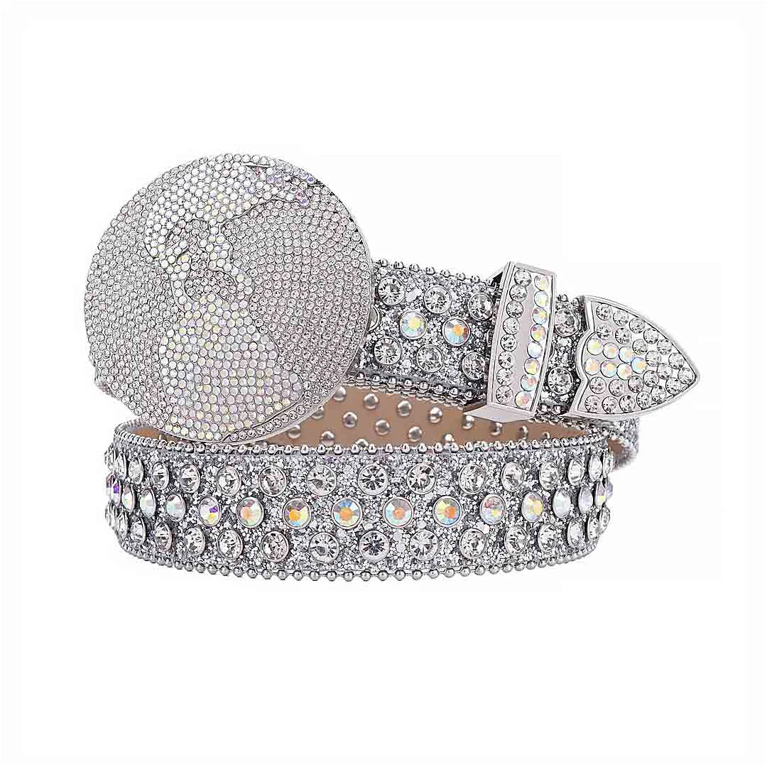 Silver Globe Leather Belt with Studded Multi silver Rhinestones & Silver Globe Buckle Add a touch of luxury and sparkle to your outfit with the Unisex Silver Leather Belt from Real Rhinestone. Featuring a sleek Silver leather strap, this stylish belt is adorned with Silver rhinestones, creating a bold and glamorous look. The Silver buckle, decorated with Silver color crystal rhinestones, enhances the design with extra shine and sophistication. Designed for versatility and comfort, this belt is perfect for both casual and dressy occasions. Whether you re looking to complete a hip-hop-inspired outfit, make a statement at an event, or simply add some extra bling to your wardrobe, this belt is the perfect accessory. Its adjustable fit ensures all-day comfort, while the high-quality materials guarantee durability and long-lasting wear. Elevate your style effortlessly with the Unisex Silver Leather Belt. Whether you re hitting the stage, going out with friends, or just upgrading your everyday look, this belt is a must-have. Order now from Real Rhinestone and bring some diamond-studded brilliance to your collection. Material: Premium Leather Rhinestone: Luxury Hand-Set High-Gloss Crystal Diamond Embellishments Buckle Type: Classic globe Zinc Buckle Set Featuring Engraved Design & Sparkling Rhinestones Width: 4cm (1.5 Inch) Style: Streetwear, Cowboy, Western, Partywear, Festivals & Performances, Fashion, Hip Hop, Bling, Diamond Belt Measurement: Please note that measurements may vary by 1-2 cm. Our belts are measured from the fold where the buckle is attached to the middle hole. For the best fit, we recommend measuring a belt you already own from the fold to the hole you use most frequently. Ideally, the belt should be worn on the third hole for optimal fit and comfort.