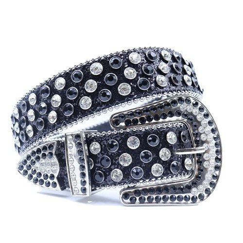 Unisex Black Leather Belt Featuring Sparkling Black & White Rhinestones with Classic Silver Horseshoe Buckle Add a touch of luxury and sparkle to your outfit with the Unisex Black Leather Belt from Real Rhinestone. Featuring a sleek Black leather strap, this stylish belt is adorned with Black And White Color diamond rhinestones, creating a bold and glamorous look. The Silver buckle, decorated with black and white crystal rhinestones, enhances the design with extra shine and sophistication. Designed for versatility and comfort, this belt is perfect for both casual and dressy occasions. Whether you are looking to complete a hip-hop-inspired outfit, make a statement at an event, or simply add some extra bling to your wardrobe, this belt is the perfect accessory. Its adjustable fit ensures all-day comfort, while the high-quality materials guarantee durability and long-lasting wear. Elevate your style effortlessly with the Unisex Black Leather Belt. Whether you are hitting the stage, going out with friends, or just upgrading your everyday look, this belt is a must-have. Order now from Real Rhinestone and bring some diamond-studded brilliance to your collection. Material: Premium Leather Rhinestone: Luxury Hand-Set High-Gloss Crystal Diamond Embellishments Buckle Type: Classic horseshoe Zinc Buckle Set Featuring Engraved Design & Sparkling Rhinestones Width: 4cm (1.5 Inch) Style: Streetwear, Cowboy, Western, Partywear, Festivals & Performances, Fashion, Hip Hop, Bling, Diamond Belt Measurement: Please note that measurements may vary by 1-2 cm. Our belts are measured from the fold where the buckle is attached to the middle hole. For the best fit, we recommend measuring a belt you already own from the fold to the hole you use most frequently. Ideally, the belt should be worn on the third hole for optimal fit and comfort.