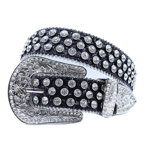 Unisex Black Leather Belt Accented With Brilliant White Rhinestones And Intricately Designed Silver Horseshoe Buckle Add a touch of luxury and sparkle to your outfit with the Unisex Black Leather Belt from Real Rhinestone. Featuring a sleek black leather strap, this stylish belt is adorned with White Color diamond rhinestones, creating a bold and glamorous look. The Silver buckle, decorated with designs, enhances the design with extra shine and sophistication. Designed for versatility and comfort, this belt is perfect for both casual and dressy occasions. Whether you are looking to complete a hip-hop-inspired outfit, make a statement at an event, or simply add some extra bling to your wardrobe, this belt is the perfect accessory. Its adjustable fit ensures all-day comfort, while the high-quality materials guarantee durability and long-lasting wear. Elevate your style effortlessly with the Unisex Black Leather Belt. Whether you are hitting the stage, going out with friends, or just upgrading your everyday look, this belt is a must-have. Order now from Real Rhinestone and bring some diamond-studded brilliance to your collection. Material: Premium Leather Rhinestone: Luxury Hand-Set High-Gloss Crystal Diamond Embellishments Buckle Type: Classic horseshoe Zinc Buckle Set Featuring Engraved Design & Sparkling Rhinestones Width: 4cm (1.5 Inch) Style: Streetwear, Cowboy, Western, Partywear, Festivals & Performances, Fashion, Hip Hop, Bling, Diamond Belt Measurement: Please note that measurements may vary by 1-2 cm. Our belts are measured from the fold where the buckle is attached to the middle hole. For the best fit, we recommend measuring a belt you already own from the fold to the hole you use most frequently. Ideally, the belt should be worn on the third hole for optimal fit and comfort.
