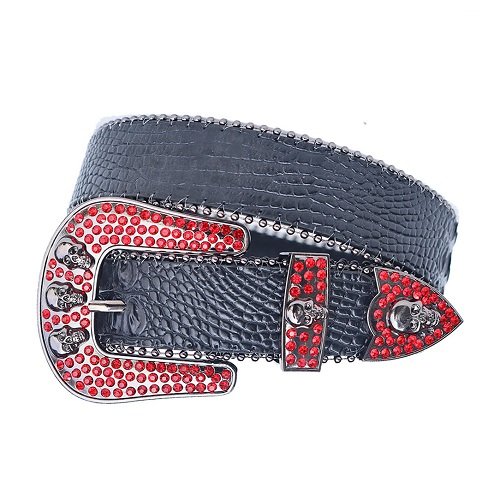 Unisex Black Textured Leather Belt Adorned with Striking Red Rhinestones and Detailed Silver Skull Buckle. Add a touch of luxury and sparkle to your outfit with the Unisex Black Textured Leather Belt from Real Rhinestone. Featuring a sleek black textured leather strap, this stylish belt is adorned with Red Color diamond rhinestones, creating a bold and glamorous look. The Skull buckle, decorated with red crystal rhinestones, enhances the design with extra shine and sophistication. Designed for versatility and comfort, this belt is perfect for both casual and dressy occasions. Whether you are looking to complete a hip-hop-inspired outfit, make a statement at an event, or simply add some extra bling to your wardrobe, this belt is the perfect accessory. Its adjustable fit ensures all-day comfort, while the high-quality materials guarantee durability and long-lasting wear. Elevate your style effortlessly with the Unisex Black Textured Leather Belt. Whether you are hitting the stage, going out with friends, or just upgrading your everyday look, this belt is a must-have. Order now from Real Rhinestone and bring some diamond-studded brilliance to your collection. Material: Premium Leather Rhinestone: Luxury Hand-Set High-Gloss Crystal Diamond Embellishments Buckle Type: Classic horseshoe Zinc Buckle Set Featuring Engraved Design & Sparkling Rhinestones Width: 4cm (1.5 Inch) Style: Streetwear, Cowboy, Western, Partywear, Festivals & Performances, Fashion, Hip Hop, Bling, Diamond Belt Measurement: Please note that measurements may vary by 1-2 cm. Our belts are measured from the fold where the buckle is attached to the middle hole. For the best fit, we recommend measuring a belt you already own from the fold to the hole you use most frequently. Ideally, the belt should be worn on the third hole for optimal fit and comfort..