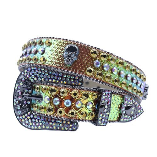Unisex Gold and Green leather belt, with studded skulls and Iridescent rhinestones decorated in a distinctive pattern. Add a touch of luxury and sparkle to your outfit with the Unisex Gold and Green Leather Belt from Real Rhinestone. Featuring a Gold and Green leather strap, this stylish belt is adorned with Iridescent Color diamond rhinestones, creating a bold and glamorous look. The Gray buckle, decorated with Iridescent crystal rhinestones, enhances the design with extra shine and sophistication. Designed for versatility and comfort, this belt is perfect for both casual and dressy occasions. Whether you are looking to complete a hip-hop-inspired outfit, make a statement at an event, or simply add some extra bling to your wardrobe, this belt is the perfect accessory. Its adjustable fit ensures all-day comfort, while the high-quality materials guarantee durability and long-lasting wear. Elevate your style effortlessly with the Unisex Gold and Green Leather Belt. Whether you are hitting the stage, going out with friends, or just upgrading your everyday look, this belt is a must-have. Order now from Real Rhinestone and bring some diamond-studded brilliance to your collection. Material: Premium Leather Rhinestone: Luxury Hand-Set High-Gloss Crystal Diamond Embellishments Buckle Type: Classic horseshoe Zinc Buckle Set Featuring Engraved Design & Sparkling Rhinestones Width: 4cm (1.5 Inch) Style: Streetwear, Cowboy, Western, Partywear, Festivals & Performances, Fashion, Hip Hop, Bling, Diamond Belt Measurement: Please note that measurements may vary by 1-2 cm. Our belts are measured from the fold where the buckle is attached to the middle hole. For the best fit, we recommend measuring a belt you already own from the fold to the hole you use most frequently. Ideally, the belt should be worn on the third hole for optimal fit and comfort.