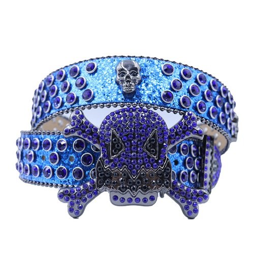 Unisex Blue Leather Belt with Metal Studded Blue Rhinestones & Classic Silver Skull Buckle Add a touch of luxury and sparkle to your outfit with the Unisex Blue Leather Belt from Real Rhinestone. Featuring a sleek Blue leather strap, this stylish belt is adorned with Blue Color diamond rhinestones, creating a bold and glamorous look. The Silver buckle, decorated with blue crystal rhinestones, enhances the design with extra shine and sophistication. Designed for versatility and comfort, this belt is perfect for both casual and dressy occasions. Whether you are looking to complete a hip-hop-inspired outfit, make a statement at an event, or simply add some extra bling to your wardrobe, this belt is the perfect accessory. Its adjustable fit ensures all-day comfort, while the high-quality materials guarantee durability and long-lasting wear. Elevate your style effortlessly with the Unisex Blue Leather Belt. Whether you are hitting the stage, going out with friends, or just upgrading your everyday look, this belt is a must-have. Order now from Real Rhinestone and bring some diamond-studded brilliance to your collection. Material: Premium Leather Rhinestone: Luxury Hand-Set High-Gloss Crystal Diamond Embellishments Buckle Type: Classic Skull Zinc Buckle Set Featuring Engraved Design & Sparkling Rhinestones Width: 4cm (1.5 Inch) Style: Streetwear, Cowboy, Western, Partywear, Festivals & Performances, Fashion, Hip Hop, Bling, Diamond Belt Measurement: Please note that measurements may vary by 1-2 cm. Our belts are measured from the fold where the buckle is attached to the middle hole. For the best fit, we recommend measuring a belt you already own from the fold to the hole you use most frequently. Ideally, the belt should be worn on the third hole for optimal fit and comfort.