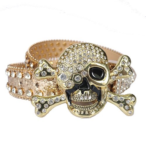 Gold glitter faux leather belt, adorned with silver rhinestones along the strap and a dramatic buckle featuring a gold-tone skull and crossbones encrusted with rhinestones Add a touch of luxury and sparkle to your outfit with the Unisex Gold Leather Belt from Real Rhinestone. Featuring a sleek Gold leather strap, this stylish belt is adorned with Gold Color diamond rhinestones, creating a bold and glamorous look. The Silver buckle, decorated with silver crystal rhinestones, enhances the design with extra shine and sophistication. Designed for versatility and comfort, this belt is perfect for both casual and dressy occasions. Whether you are looking to complete a hip-hop-inspired outfit, make a statement at an event, or simply add some extra bling to your wardrobe, this belt is the perfect accessory. Its adjustable fit ensures all-day comfort, while the high-quality materials guarantee durability and long-lasting wear. Elevate your style effortlessly with the Unisex Gold Leather Belt. Whether you are hitting the stage, going out with friends, or just upgrading your everyday look, this belt is a must-have. Order now from Real Rhinestone and bring some diamond-studded brilliance to your collection. Material: Premium Leather Rhinestone: Luxury Hand-Set High-Gloss Crystal Diamond Embellishments Buckle Type: Classic Skull Zinc Buckle Set Featuring Engraved Design & Sparkling Rhinestones Width: 4cm (1.5 Inch) Style: Streetwear, Cowboy, Western, Partywear, Festivals & Performances, Fashion, Hip Hop, Bling, Diamond Belt Measurement: Please note that measurements may vary by 1-2 cm. Our belts are measured from the fold where the buckle is attached to the middle hole. For the best fit, we recommend measuring a belt you already own from the fold to the hole you use most frequently. Ideally, the belt should be worn on the third hole for optimal fit and comfort.