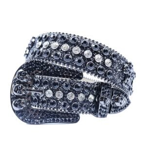Unisex black textured leather belt, featuring skull studs and  white and black rhinestones belt Add a touch of luxury and sparkle to your outfit with the Unisex Black Leather Belt from Real Rhinestone. Featuring a black leather strap, this stylish belt is adorned with White and Black Color diamond rhinestones, creating a bold and glamorous look. The Gray buckle, decorated with black crystal rhinestones, enhances the design with extra shine and sophistication. Designed for versatility and comfort, this belt is perfect for both casual and dressy occasions. Whether you are looking to complete a hip-hop-inspired outfit, make a statement at an event, or simply add some extra bling to your wardrobe, this belt is the perfect accessory. Its adjustable fit ensures all-day comfort, while the high-quality materials guarantee durability and long-lasting wear. Elevate your style effortlessly with the Unisex Black Leather Belt. Whether you are hitting the stage, going out with friends, or just upgrading your everyday look, this belt is a must-have. Order now from Real Rhinestone and bring some diamond-studded brilliance to your collection. Material: Premium Leather Rhinestone: Luxury Hand-Set High-Gloss Crystal Diamond Embellishments Buckle Type: Classic horseshoe Zinc Buckle Set Featuring Engraved Design & Sparkling Rhinestones Width: 4cm (1.5 Inch) Style: Streetwear, Cowboy, Western, Partywear, Festivals & Performances, Fashion, Hip Hop, Bling, Diamond Belt Measurement: Please note that measurements may vary by 1-2 cm. Our belts are measured from the fold where the buckle is attached to the middle hole. For the best fit, we recommend measuring a belt you already own from the fold to the hole you use most frequently. Ideally, the belt should be worn on the third hole for optimal fit and comfort.