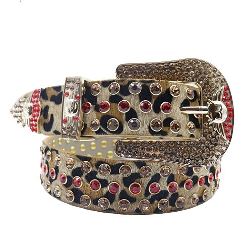Unisex Leopard Print Belt Accented with Brown And Red Rhinestones Add a touch of luxury and sparkle to your outfit with the Unisex Leopard Print Leather Belt from Real Rhinestone. Featuring a sleek gold and black leather strap, this stylish belt is adorned with brown and red Color diamond rhinestones, creating a bold and glamorous look. The polished buckle, decorated with rhinestones, enhances the design with extra shine and sophistication. Designed for versatility and comfort, this belt is perfect for both casual and dressy occasions. Whether you are looking to complete a hip-hop-inspired outfit, make a statement at an event, or simply add some extra bling to your wardrobe, this belt is the perfect accessory. Its adjustable fit ensures all-day comfort, while the high-quality materials guarantee durability and long-lasting wear. Elevate your style effortlessly with the Unisex Leopard Print Leather Belt. Whether you are hitting the stage, going out with friends, or just upgrading your everyday look, this belt is a must-have. Order now from Real Rhinestone and bring some diamond-studded brilliance to your collection. Material: Premium Leather Rhinestone: Luxury Hand-Set High-Gloss Crystal Diamond Embellishments Buckle Type: Classic horseshoe Zinc Buckle Set Featuring Engraved Design & Sparkling Rhinestones Width: 4cm (1.5 Inch) Style: Streetwear, Cowboy, Western, Partywear, Festivals & Performances, Fashion, Hip Hop, Bling, Diamond Belt Measurement: Please note that measurements may vary by 1-2 cm. Our belts are measured from the fold where the buckle is attached to the middle hole. For the best fit, we recommend measuring a belt you already own from the fold to the hole you use most frequently. Ideally, the belt should be worn on the third hole for optimal fit and comfort.