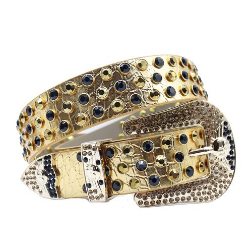 Unisex Gold Leather Belt Studded with Sparkling black and gold Rhinestones and Polished Horseshoe Buckle Add a touch of luxury and sparkle to your outfit with the Unisex Gold Leather Belt from Real Rhinestone. Featuring a sleek gold leather strap, this stylish belt is adorned with black and gold Color diamond rhinestones, creating a bold and glamorous look. The polished silver buckle, decorated with rhinestones, enhances the design with extra shine and sophistication. Designed for versatility and comfort, this belt is perfect for both casual and dressy occasions. Whether you are looking to complete a hip-hop-inspired outfit, make a statement at an event, or simply add some extra bling to your wardrobe, this belt is the perfect accessory. Its adjustable fit ensures all-day comfort, while the high-quality materials guarantee durability and long-lasting wear. Elevate your style effortlessly with the Unisex Gold Leather Belt. Whether you are hitting the stage, going out with friends, or just upgrading your everyday look, this belt is a must-have. Order now from Real Rhinestone and bring some diamond-studded brilliance to your collection. Material: Premium Leather Rhinestone: Luxury Hand-Set High-Gloss Crystal Diamond Embellishments Buckle Type: Classic horseshoe Zinc Buckle Set Featuring Engraved Design & Sparkling Rhinestones Width: 4cm (1.5 Inch) Style: Streetwear, Cowboy, Western, Partywear, Festivals & Performances, Fashion, Hip Hop, Bling, Diamond Belt Measurement: Please note that measurements may vary by 1-2 cm. Our belts are measured from the fold where the buckle is attached to the middle hole. For the best fit, we recommend measuring a belt you already own from the fold to the hole you use most frequently. Ideally, the belt should be worn on the third hole for optimal fit and comfort.
