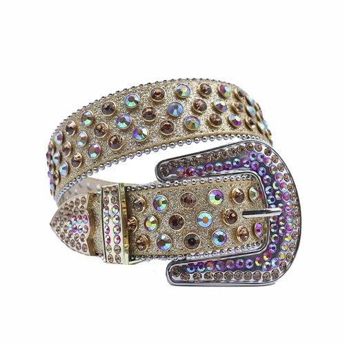 Unisex Gold Leather Belt Adorned with Sparkling Iridescent, Purple And Gold Rhinestones and Polished Buckle Add a touch of luxury and sparkle to your outfit with the Unisex Gold Leather Belt from Real Rhinestone. Featuring a sleek gold leather strap, this stylish belt is adorned with Iridescent, Purple And Gold Color diamond rhinestones, creating a bold and glamorous look. The polished buckle, decorated with rhinestones, enhances the design with extra shine and sophistication. Designed for versatility and comfort, this belt is perfect for both casual and dressy occasions. Whether you are looking to complete a hip-hop-inspired outfit, make a statement at an event, or simply add some extra bling to your wardrobe, this belt is the perfect accessory. Its adjustable fit ensures all-day comfort, while the high-quality materials guarantee durability and long-lasting wear. Elevate your style effortlessly with the Unisex Gold Leather Belt. Whether you are hitting the stage, going out with friends, or just upgrading your everyday look, this belt is a must-have. Order now from Real Rhinestone and bring some diamond-studded brilliance to your collection. Material: Premium Leather Rhinestone: Luxury Hand-Set High-Gloss Crystal Diamond Embellishments Buckle Type: Classic horseshoe Zinc Buckle Set Featuring Engraved Design & Sparkling Rhinestones Width: 4cm (1.5 Inch) Style: Streetwear, Cowboy, Western, Partywear, Festivals & Performances, Fashion, Hip Hop, Bling, Diamond Belt Measurement: Please note that measurements may vary by 1-2 cm. Our belts are measured from the fold where the buckle is attached to the middle hole. For the best fit, we recommend measuring a belt you already own from the fold to the hole you use most frequently. Ideally, the belt should be worn on the third hole for optimal fit and comfort.