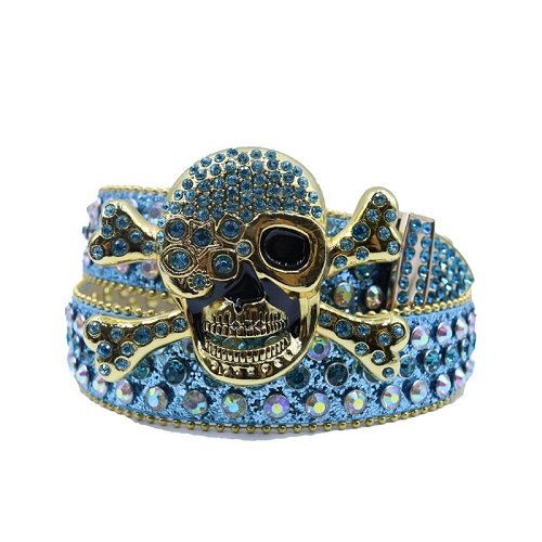 Unisex blue glitter leather belt, accented with blue and iridescent rhinestones along the strap and a dramatic buckle featuring a gold-tone skull and crossbones encrusted with rhinestones Add a touch of luxury and sparkle to your outfit with the Unisex Blue Leather Belt from Real Rhinestone. Featuring a sleek blue leather strap, this stylish belt is adorned with  Blue And Iridescent Color diamond rhinestones, creating a bold and glamorous look. The Silver buckle, decorated with blue crystal rhinestones, enhances the design with extra shine and sophistication. Designed for versatility and comfort, this belt is perfect for both casual and dressy occasions. Whether you are looking to complete a hip-hop-inspired outfit, make a statement at an event, or simply add some extra bling to your wardrobe, this belt is the perfect accessory. Its adjustable fit ensures all-day comfort, while the high-quality materials guarantee durability and long-lasting wear. Elevate your style effortlessly with the Unisex Blue Leather Belt. Whether you are hitting the stage, going out with friends, or just upgrading your everyday look, this belt is a must-have. Order now from Real Rhinestone and bring some diamond-studded brilliance to your collection. Material: Premium Leather Rhinestone: Luxury Hand-Set High-Gloss Crystal Diamond Embellishments Buckle Type: Classic Skull Zinc Buckle Set Featuring Engraved Design & Sparkling Rhinestones Width: 4cm (1.5 Inch) Style: Streetwear, Cowboy, Western, Partywear, Festivals & Performances, Fashion, Hip Hop, Bling, Diamond Belt Measurement: Please note that measurements may vary by 1-2 cm. Our belts are measured from the fold where the buckle is attached to the middle hole. For the best fit, we recommend measuring a belt you already own from the fold to the hole you use most frequently. Ideally, the belt should be worn on the third hole for optimal fit and comfort.