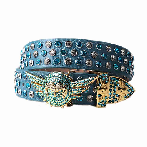 Unisex Blue Textured Leather Belt Adorned With Blue And Silver Rhinestones And Polished Gold Wing Buckle Add a touch of luxury and sparkle to your outfit with the Unisex Blue Leather Belt from Real Rhinestone. Featuring a sleek blue leather strap, this stylish belt is adorned with silver and blue Color diamond rhinestones, creating a bold and glamorous look. The Gold buckle, decorated with rhinestones, enhances the design with extra shine and sophistication. Designed for versatility and comfort, this belt is perfect for both casual and dressy occasions. Whether you are looking to complete a hip-hop-inspired outfit, make a statement at an event, or simply add some extra bling to your wardrobe, this belt is the perfect accessory. Its adjustable fit ensures all-day comfort, while the high-quality materials guarantee durability and long-lasting wear. Elevate your style effortlessly with the Unisex blue Leather Belt. Whether you are hitting the stage, going out with friends, or just upgrading your everyday look, this belt is a must-have. Order now from Real Rhinestone and bring some diamond-studded brilliance to your collection. Material: Premium Leather Rhinestone: Luxury Hand-Set High-Gloss Crystal Diamond Embellishments Buckle Type: Classic wing Zinc Buckle Set Featuring Engraved Design & Sparkling Rhinestones Width: 4cm (1.5 Inch) Style: Streetwear, Cowboy, Western, Partywear, Festivals & Performances, Fashion, Hip Hop, Bling, Diamond Belt Measurement: Please note that measurements may vary by 1-2 cm. Our belts are measured from the fold where the buckle is attached to the middle hole. For the best fit, we recommend measuring a belt you already own from the fold to the hole you use most frequently. Ideally, the belt should be worn on the third hole for optimal fit and comfort.