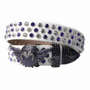 Unisex White Textured Leather Belt Encrusted With Silver And Blue Rhinestones And Polished Black wing Buckle Add a touch of luxury and sparkle to your outfit with the Unisex White Leather Belt from Real Rhinestone. Featuring a sleek White leather strap, this stylish belt is adorned with  Silver And Blue Color diamond rhinestones, creating a bold and glamorous look. The Black buckle, decorated with blue rhinestones, enhances the design with extra shine and sophistication. Designed for versatility and comfort, this belt is perfect for both casual and dressy occasions. Whether you are looking to complete a hip-hop-inspired outfit, make a statement at an event, or simply add some extra bling to your wardrobe, this belt is the perfect accessory. Its adjustable fit ensures all-day comfort, while the high-quality materials guarantee durability and long-lasting wear. Elevate your style effortlessly with the Unisex White Leather Belt. Whether you are hitting the stage, going out with friends, or just upgrading your everyday look, this belt is a must-have. Order now from Real Rhinestone and bring some diamond-studded brilliance to your collection. Material: Premium Leather Rhinestone: Luxury Hand-Set High-Gloss Crystal Diamond Embellishments Buckle Type: Classic wing Zinc Buckle Set Featuring Engraved Design & Sparkling Rhinestones Width: 4cm (1.5 Inch) Style: Streetwear, Cowboy, Western, Partywear, Festivals & Performances, Fashion, Hip Hop, Bling, Diamond Belt Measurement: Please note that measurements may vary by 1-2 cm. Our belts are measured from the fold where the buckle is attached to the middle hole. For the best fit, we recommend measuring a belt you already own from the fold to the hole you use most frequently. Ideally, the belt should be worn on the third hole for optimal fit and comfort.
