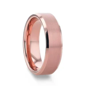 EROS Rose Gold Tungsten Wedding Band For Men with Beveled Edges Thorsten - 8mm Step into your forever love story fit for the gods with our rose gold band featuring a brushed finish and beveled edges for added effects. Your friends and family will not help but to notice the unique and elegant ring wrapped around your ring finger. Our rose gold EROS ring symbolizes elegance and affluence as well as letting the world know that you love exclusivity without compromising your pocket book. Celebrate your godly love by choosing our unique and romantic EROS Tungsten wedding band. Beautiful rose gold plated comfort fit band Available in an 8mm width Add an engraving for an extra personal touch Covered by the Thorsten lifetime warranty Brand: Thorsten Metal Type: Tungsten Carbide Color: Rose Gold Finish: Brushed Style: Beveled Stones: None SKU: ORGT-8037