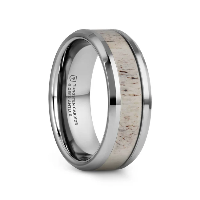 WHITETAIL Polished Beveled Tungsten Carbide Men's Wedding Band with Off-White Deer Antler Inlay - 8mm A masculine and beautifully polished and beveled finish Tungsten Carbide wedding band by Thorsten with inlaid light brown deer antler of white, brown, and tan tones. Perfect for outdoor enthusiasts as well as hunters! Engraving available! See Pictures for Details. Does Not Delay Order. Includes Thorsten Lifetime and Lifetime Sizing Warranty (excluding re-engraving). Available in an 8mm width. Other widths available upon request as a custom order. Each antler ring pattern is unique and will differ in each ring. Tungsten Carbide—the newest and strongest metal for jewelry that does not scratch easily. Comfort Fit – domed interior band slides over the knuckle easier with less friction. Brand: Thorsten Metal Type: Tungsten Carbide Color: Silver|White Finish: Polished Style: Beveled Stones: None SKU: W1537-TCBD
