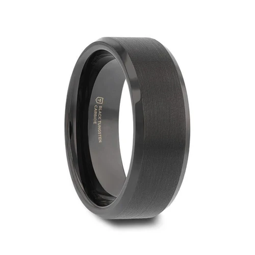 Made from high grade Black Tungsten Carbide this durable, simple yet elegant Thorsten design features a flat-profiled band with a finely brushed finish and polished beveled edges with a subtle touch of shine.  Includes Thorsten Lifetime and Lifetime Sizing Warranty (excluding re-engraving) Available in 4mm, 6mm, 7mm, 8mm, and 10mm widths for couples who want a matching set Please note, Black Tungsten Carbide rings are scratch-resistant and very durable but can be scratched Comfort Fit – domed interior band slides over the knuckle easier with less friction Brand: Thorsten Metal Type: Black Tungsten Color: Black Finish: Brushed Style: Beveled|Flat Stones: None SKU: W2048-FBBE