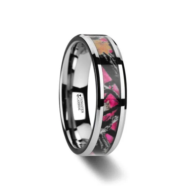 JULIET Realistic Tree Camo Tungsten Carbide Wedding Band with Real Pink Oak Leaves - 6mm - 8mm This is an awesome tungsten carbide wedding band with a hand designed pink oak leaf camo inlay. Extremely durable with beveled edges, this pink oak camo tungsten ring is a definite eye catcher. This comfort-fit band comes in an 8mm width. Note, inlay is protected by a resin that can be scratched. Re-sizing and Warranty on all Thorsten alternative metal rings, limited exchange|sizing fees compared to our competitors. While supplies last. Brand: Thorsten Metal Type: Tungsten Carbide Color: Multi-Colored|Silver Finish: Polished Style: Beveled|Flat|Nature Inspired Stones: None SKU: W3081-BCPC