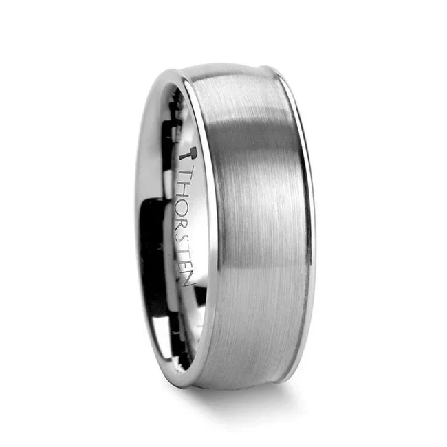 SHEFFORD Rounded Tungsten Carbide Ring with Brushed Center - 6mm and 8mm If you're looking for unique wedding bands for men, this regal ring is the way to go. The raised edges and inside are polished to create classic shine, and the center is subtly brushed for visual variance. Best of all, Shefford gives you the appearance of a traditional tungsten ring with the affordable price that comes with a band made of the earth's toughest material. Engraving available! See Pictures for Details. Does Not Delay Order. Includes Thorsten Lifetime and Lifetime Sizing Warranty (excluding re-engraving). Available in a 6mm and 8mm width. Tungsten Carbide is the newest and strongest metal for jewelry that does not scratch easily. Comfort Fit – domed interior band slides over the knuckle easier with less friction. While supplies last. Brand: Thorsten Metal Type: Tungsten Carbide Color: Silver Finish: Brushed Style: Domed Stones: None SKU: W323-SDBC