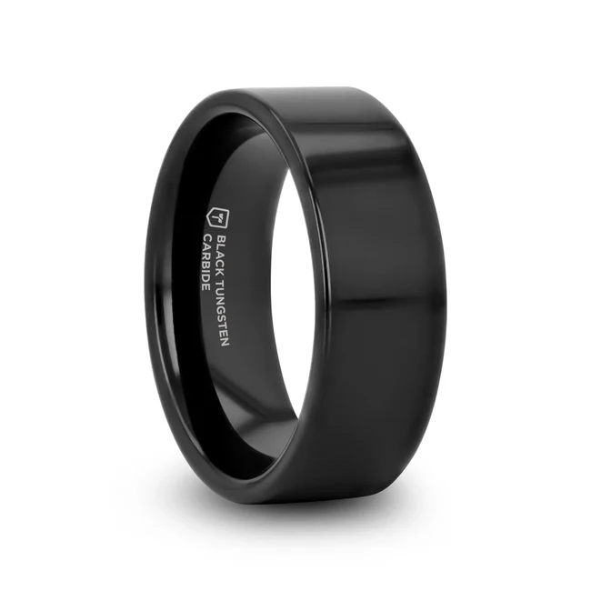 Sleek, polished and stylish is this classic and subtle Black Tungsten design by Thorsten that can be worn as a wedding band or promise ring Engraving available! See Pictures for Details. Does Not Delay Order. . Available in 2mm, 4mm, 6mm, 8mm, 10mm, and 12mm widths for couples who want a matching set. Please note, Black Tungsten Carbide rings are scratch resistant and very durable but can be scratched. Comfort Fit – domed interior band slides over the knuckle easier with less friction. Brand: Thorsten Metal Type: Black Tungsten Color: Black Finish: Polished Style: Flat Stones: None SKU: W333-FPB