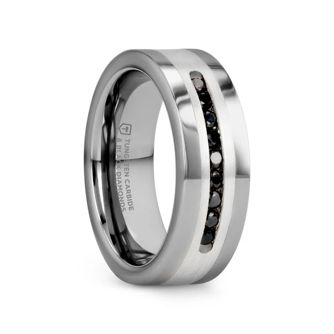 BLACKSTONE Flat Tungsten Wedding Band with Brushed Silver Inlay Center and 9 Channel Set Black Diamonds - 8mm One of our newest additions to our Diamond Tungsten Rings collection, we are proud to introduce this cobalt-free comfort fit tungsten ring with 9 black diamonds with total carat weight of 0.3 ct. This ring perfectly combines two of the hardest materials on Earth, diamonds and tungsten carbide. This ring is designed with a brush silver inlay with 9 black diamonds channel set into the silver inlay. This flat style ring also has brightly polished edges to further accentuate the gorgeous center. This ring can be worn as a Wedding Band or Promise Ring. Universal Jewelry is proud to present our Tungsten Carbide Ring line. Tungsten Carbide is the newest and strongest metal to be used in jewelry, ideal for men and women who are tired of rings that scratch easily. Re-sizing and Warranty on all Thorsten alternative metal rings, limited exchange|sizing fees compared to other retailers. Brand: Thorsten Metal Type: Tungsten Carbide Color: Black|Silver|White Finish: Polished Style: Diamonds|Precious Metal Inlay Stones: Black Diamond SKU: W3925-TCSD
