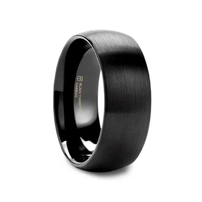 The epitome of understated elegance, this classic domed style ring by Thorsten features a nonreflective and very finely brushed surface and can be worn as a wedding ring or promise ring for both men and women. Please note, Black Tungsten Carbide rings are scratch resistant and very durable but can be scratched Comfort Fit – domed interior band slides over the knuckle easier with less friction Brand: Thorsten Metal Type: Black Tungsten Color: BlackFinish: Brushed Style: Domed Stones: None SKU: W486-DBBT