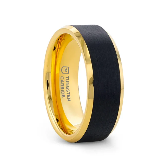 Created using the new Ion plating process that results in a much more durable and long-lasting finish, this sophisticated gold-plated Tungsten ring by Thorsten is ideal for those who want the rich look of gold at an affordable price. The beveled edges and interior are polished to perfection and the ring’s black center is treated with a subtle brushed finish. Engraving available! See Pictures for Details. Does Not Delay Order. Includes Thorsten Lifetime and Lifetime Sizing Warranty (excluding re-engraving). Tungsten Carbide—the newest and strongest metal for jewelry that does not scratch easily. Comfort Fit – domed interior band slides over the knuckle easier with less friction. Brand: Thorsten Metal Type: Tungsten Carbide Color: Black|Gold Finish: Brushed Style: Beveled Stones: None SKU: W5969-GPBT