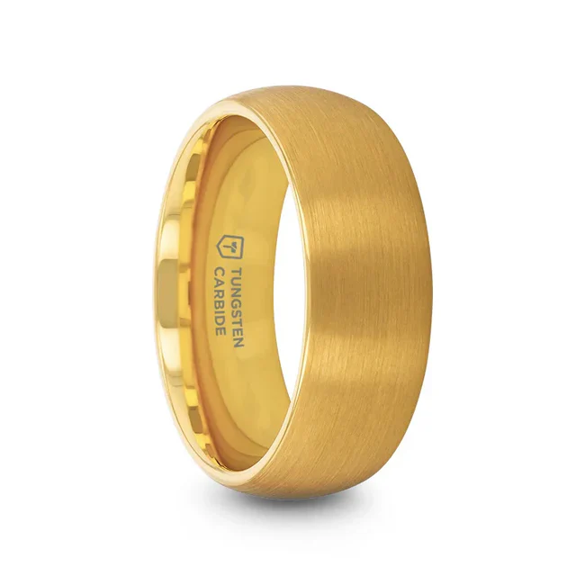 This domed wedding band has a classic yet unforgettable look that will never go out of style. It’s expertly molded in gold plated tungsten and made with a comfort fit style that promotes an easy slide. The smooth brushed finish on the exterior and clean polished finish on the interior form the perfect marriage.  Comfort Fit Brushed Finish Gold Plated Tungsten Ring Brand: Thorsten Metal Type: Tungsten Carbide Color: Gold Finish: Brushed Style: Domed Stones: None SKU: W5970-GPBD