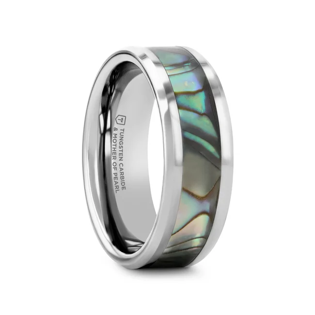 This beautiful Tungsten Carbide ring by Thorsten has polished beveled edges and a Mother-of-Pearl inlay displaying iridescent purple, blue, green, white, and black swirls like the shimmering waves in the ocean. Made from the inside lining of oyster and abalone shells, Mother-of-Pearl is a decorative material that has been used for centuries for furniture, musical instruments, and jewelry.  Includes Thorsten Lifetime and Lifetime Sizing Warranty (excluding re-engraving) Tungsten Carbide—the newest and strongest metal for jewelry that does not scratch easily. Note that the Mother-of-Pearl inlay may chip if the ring is dropped on a hard surface. Comfort Fit – domed interior band slides over the knuckle easier with less friction Brand: Thorsten Metal Type: Tungsten Carbide Color: Blue|Green|Silver Finish: Polished Style: Beveled|Mother of Pearl Inlay Stones: None SKU: W759-TMOP