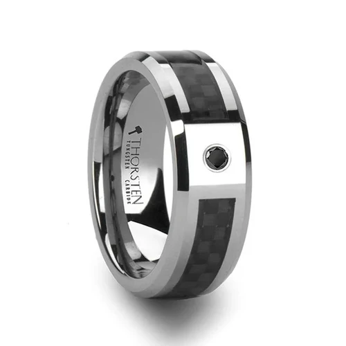 BENTLEY Tungsten Carbide Wedding Band with Black Carbon fiber and Black Diamond - 8mm Sporty and elegant are the words that come to mind when looking at this show stopping style from our tungsten wedding bandsline. This comfort fit wedding band has a flat style design with polished beveled edges. The ring is made from one piece of tungsten by cutting a channel almost all the way around the ring, leaving only the part with the 0.06 carat black diamond setting untouched. After, the beautiful black carbon fiber inlay is applied. Creating a high quality piece of work showcasing our designer skill. Universal Jewelry is proud to present the designer Tungsten Carbide Ring line by Thorsten. Tungsten Carbide is extremely scratch resistant and are a great choice for those who want jewelry to be both maintenance free and worry free. Re-sizing and Warranty on all Thorsten alternative metal rings, limited exchange|sizing fees compared to other retailers. Brand: Thorsten Metal Type: Tungsten Carbide Color: Black|Silver Finish: Polished Style: Beveled|Carbon Fiber Inlay|Diamonds Stones: Black Diamond SKU: W802-BCBD