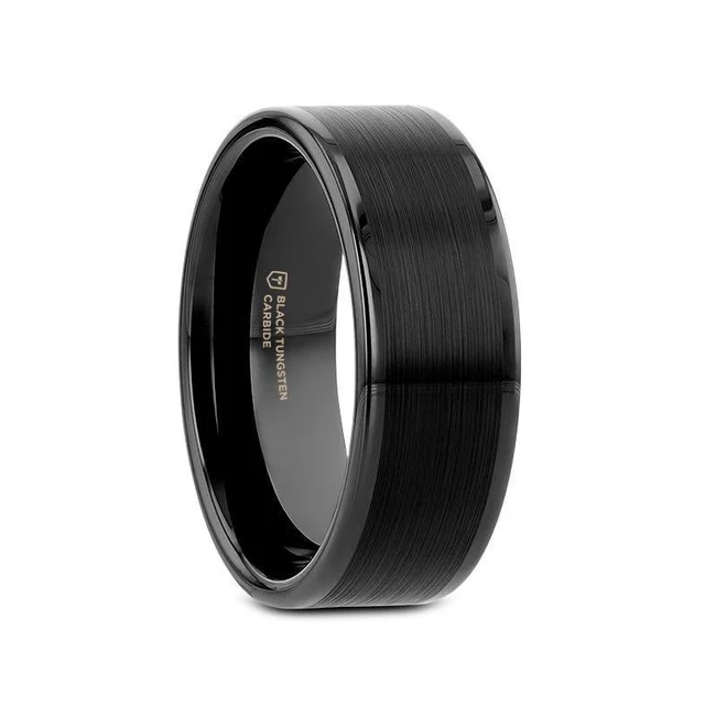This highly sought-after style from our Thorsten Black Tungsten Rings collection features a flat pipe-cut shape black Tungsten Carbide band with a beautiful brushed finished center and polished finished edges. Can be worn as a wedding band or promise ring by men or women. Includes Thorsten Lifetime and Lifetime Sizing Warranty (excluding re-engraving) Please note, Black Tungsten Carbide rings are scratch-resistant and very durable but can be scratched Comfort Fit – domed interior band slides over the knuckle easier with less friction Brand: Thorsten Metal Type: Black Tungsten Color: Black Finish: Brushed Style: Flat Stones: None SKU: W839-BFBC